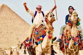 Take a guided camel tour of Egypt's magnificent Pyramids of Giza.